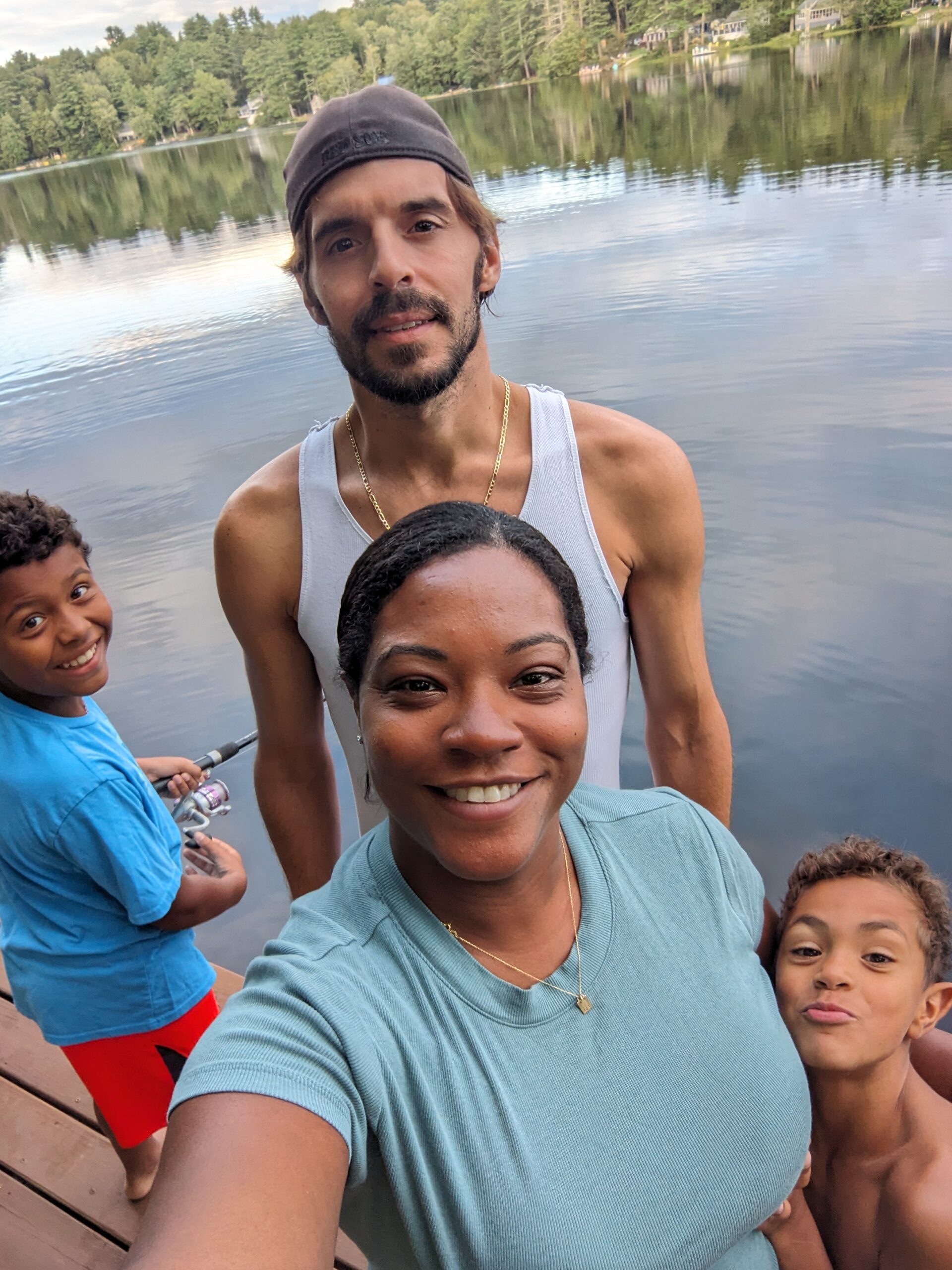 Nia Maya James with husband and two sons at the lake